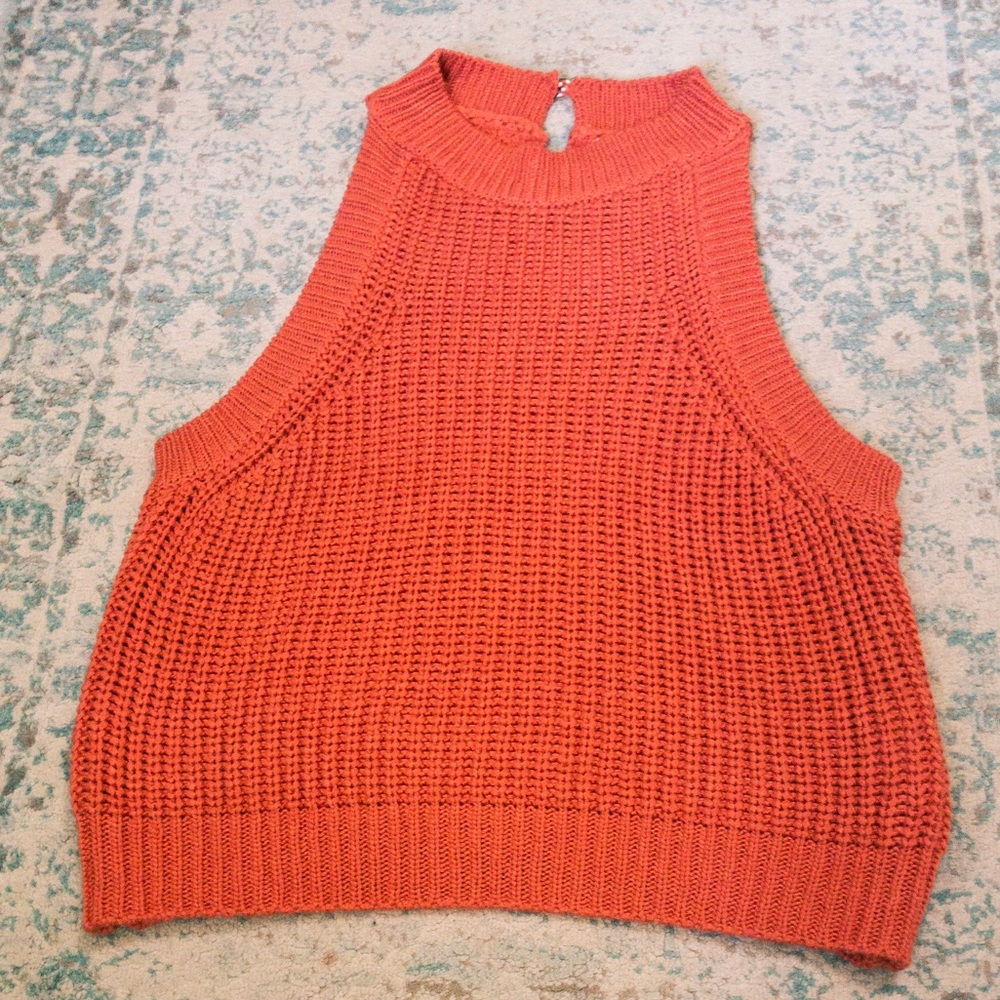 Fall orange sweater like almost crop top.